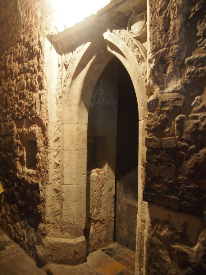 The last remaining cell door from the medieval priory. The little alcove next to the door was where the monk's meals were left for him.