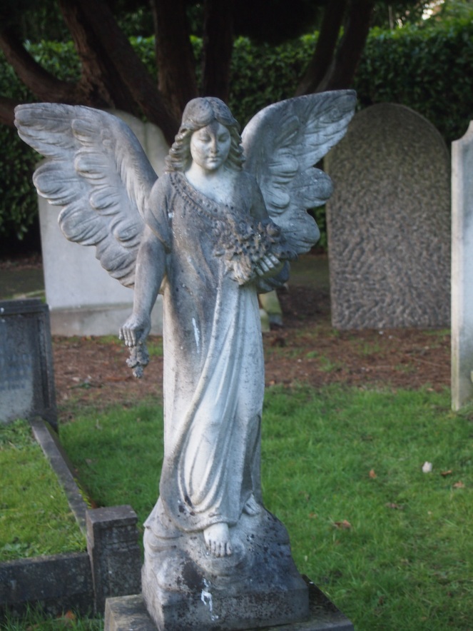 Another angel at East Sheen, marking the grave of an Iraqi-born couple