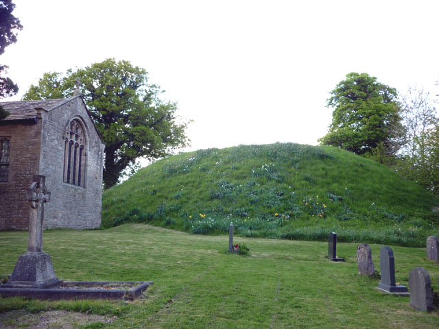 The motte behind St John the Baptist, Arkholme (image by [] via Wikimedia Commons)