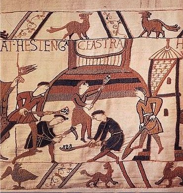 Scene from the Bayeux Tapestry depicting the building of a motte (image from Wikimedia Commons)